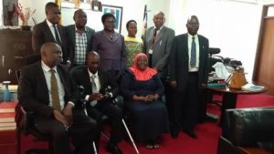 National Council for Disability members in an earlier meeting with Gender and Social Development Minister Janat Mukwaya (third from left-front row)