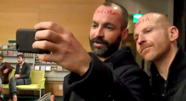 Two protesters represent Grenada and Uzbekistan, two of the 76-plus countries with anti-homosexuality laws. (Click the image to see the 10-minute video.)