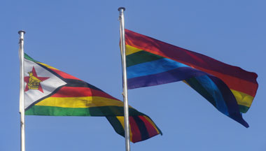 Zimbabwe and rainbow flag, side by side. (Photo courtesy of Miles R. Tanhira)