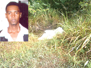 The body of Delon Melville and the bushes where his body was found (Photo courtesy of Kaieteur News)