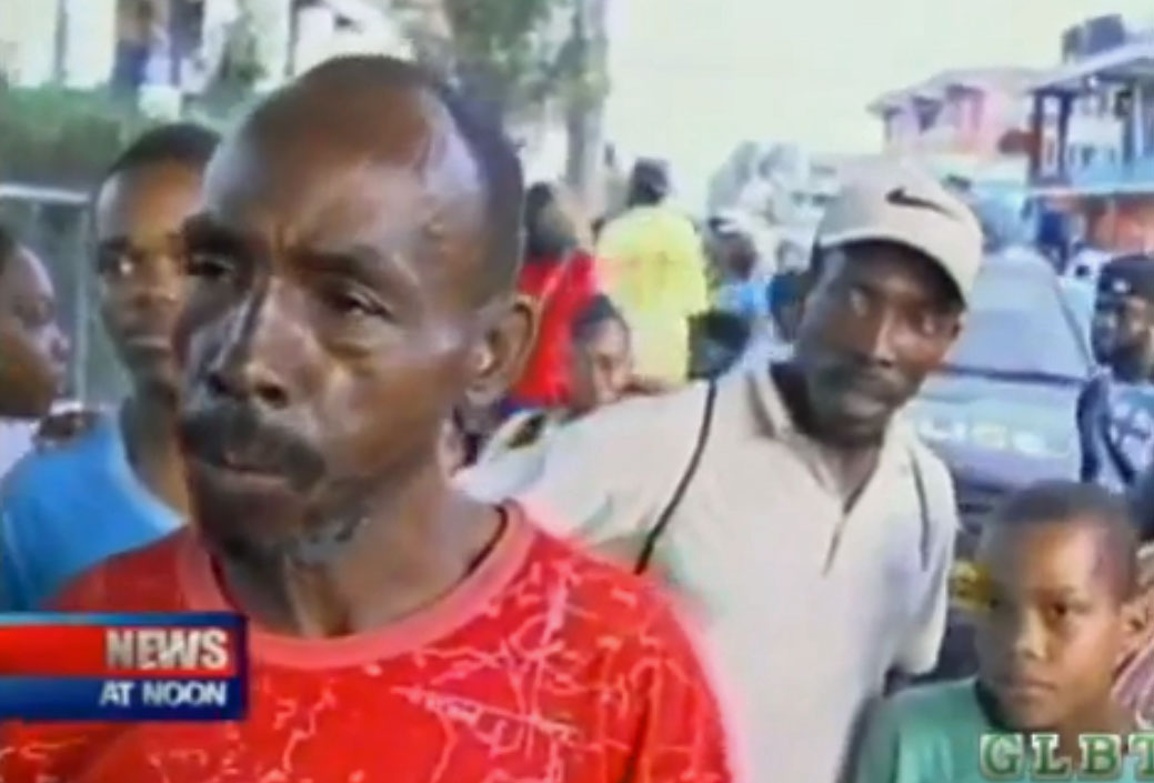 In Old Harbour, Jamaica, crowd tells news reporter that gays must go away. (Click image for the video on YouTube.)