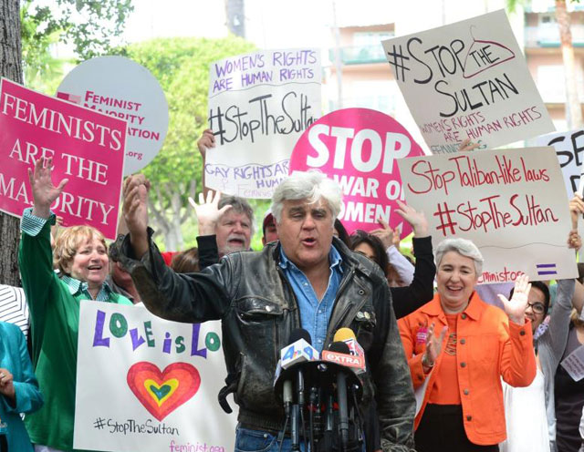 Protesters supporting both LGBT rights and women's rights joined Jay Leno in calling for people to boycott the Beverly Hills Hotel unless its ultimate owner, the Sultan of Brunei, reverses course.