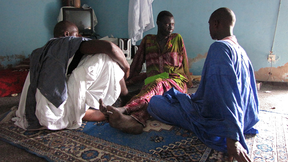 Amadou Seye N’Diaye with two Mauritanian members of the gay community in the capital, Nouakchott. (Photo courtesy AIDSPAN)