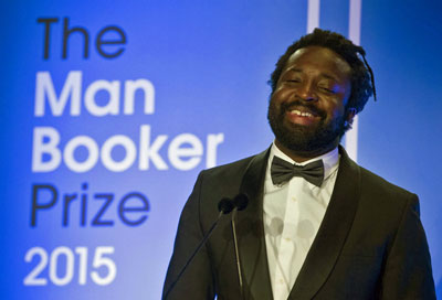 Marlon James celebrates receiving the Man Booker Prize (Photo courtesy of Pink News)