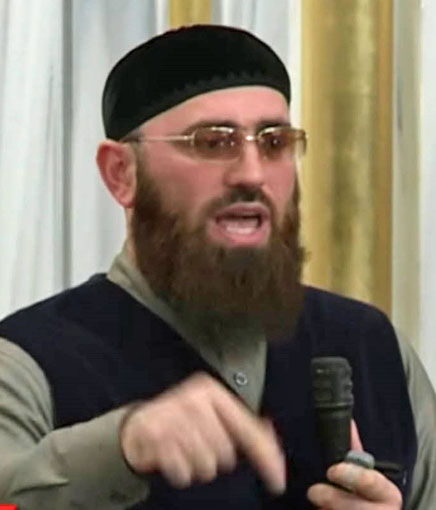 Adam Shahidov, advisor to Chechen President Ramzan Kadyrov, addressed last spring's assembly at the main mosque in Grozny, Chechnya, which called for retribution against journalists who reported on mass arrests of suspected gays in Chechnya. (Photo courtesy of Grozny TV and Novaya Gazeta)