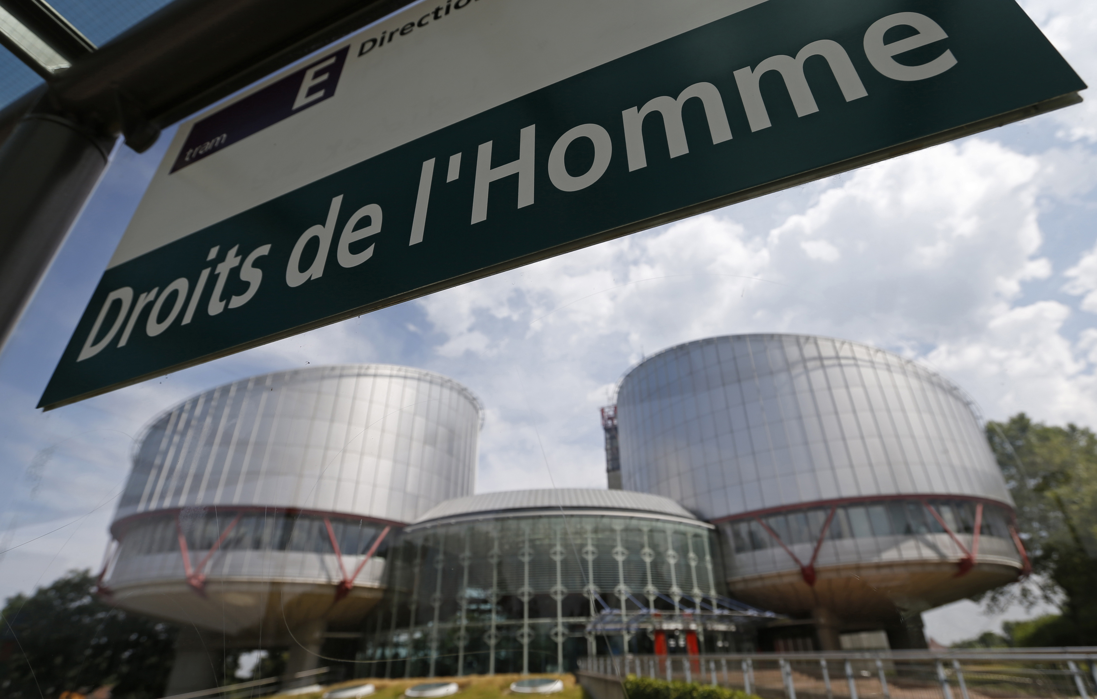 French-language sign at a tram stop reads "Human rights" in front of the European Court of Human Rights in Strasbourg, France. (Photo courtesy of Newsweek) REUTERS/Vincent Kessler (FRANCE - Tags: POLITICS SOCIETY CRIME LAW) - RTX11ZWV