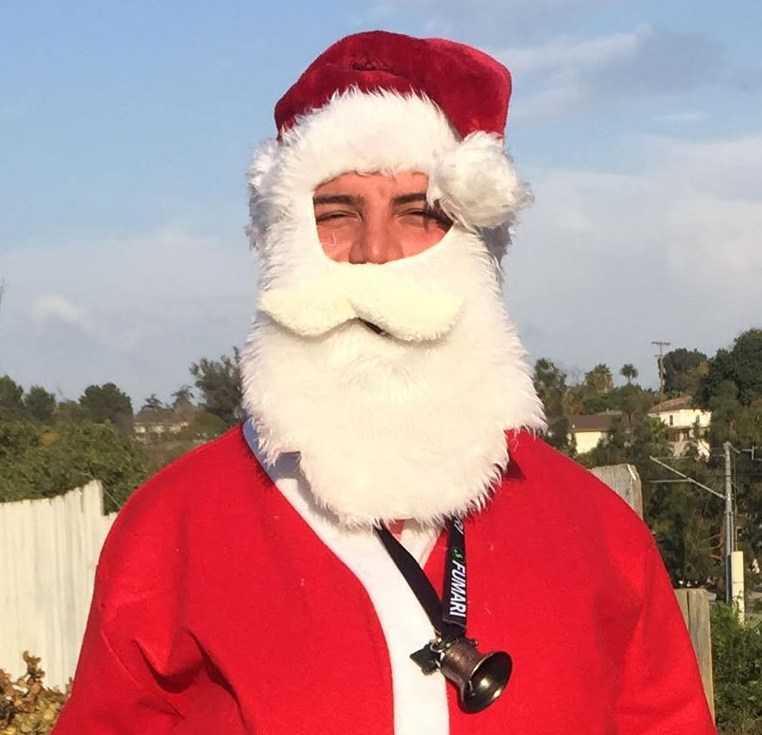 Gay Kurd refugee as Baba Noel in San Diego. (Photo courtesy of Linda Miles)