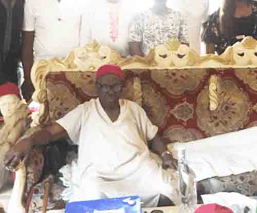 Delegates from Levites Initiative for Freedom and Enlightenment (LIFE) visit with Senator Nosike Ikpo the obi (traditional leader) of Ibusa town. For security, the LIFE members' faces are not shown. (Mike Daemon photo)