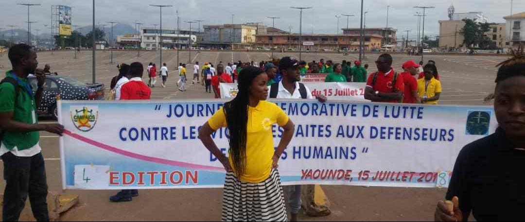 Marchers in Yaoundé, Cameroon, celebrate the Day of Remembrance of the Fight Against Violence Targeting Human Rights Defenders. (Photo courtesy of Steeves Winner)