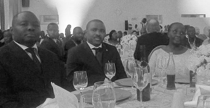 Specioza Kazibwe (right), former Ugandan vice president, and right-to-health activist Kikonyogo Kivumbi (left) at a dinner honoring people promoting improved access to health care for Ugandans. (Photo courtesy of Uhspa Uganda)