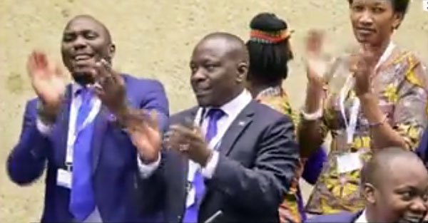 Gay rights opponents from Uganda cheer the defeat of a proposal for the Inter-Parliamentary Union to discuss anti-gay discrimination and rights abuses.