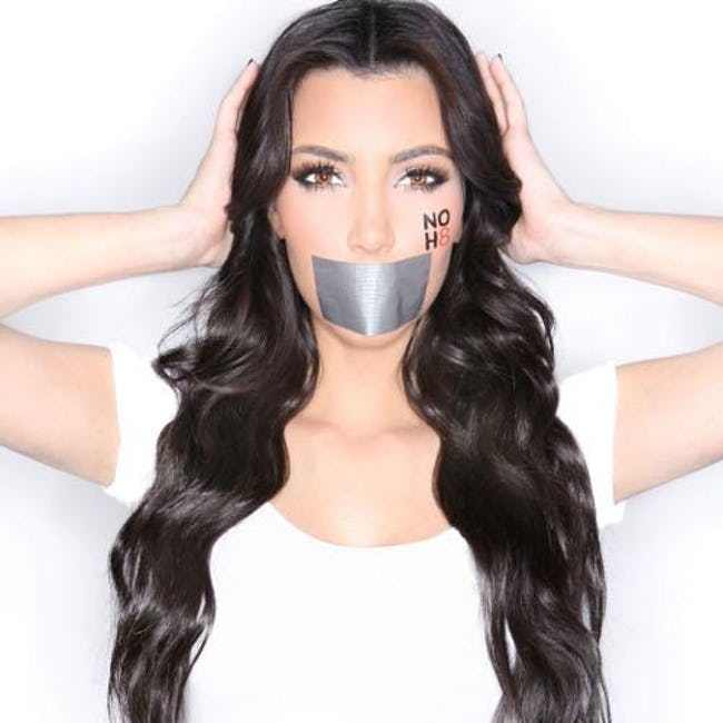 Kim Kardashian poses in support of the 