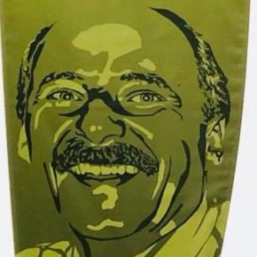 This portrait of Denis LeBlanc is displayed in Ottawa on a banner honoring him for his work for the LGBTI community.