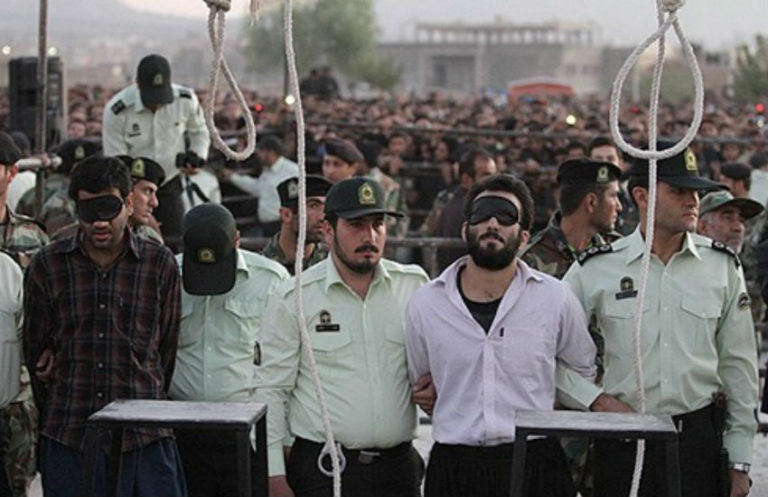 This photo, which shows a public hanging years ago in Iran, is often used to illustrate news articles about executions, such as the latest article about the January 2019 hanging of a convicted kidnapper, a 2017 article about eight people hanged on unspecified charges and commentaries in 2014 and 2016 about the pace of executions in Iran. (Photo courtesy of Wikicommons)
