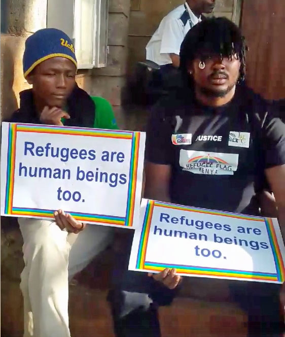 LGBT refugees protest in Nairobi, Kenya. At the right is Mbazira Moses, executive director of Rainbow Flag Kenya. (Photo courtesy of Facebook)