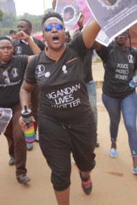 Diane Bakuruira, an LGBT activist with Sexual Minorities Uganda (SMUG), joins other women in a protest march last year through Kampala city to protest women's murders. The killings and kidnappings continue. (UhspaUganda photo)