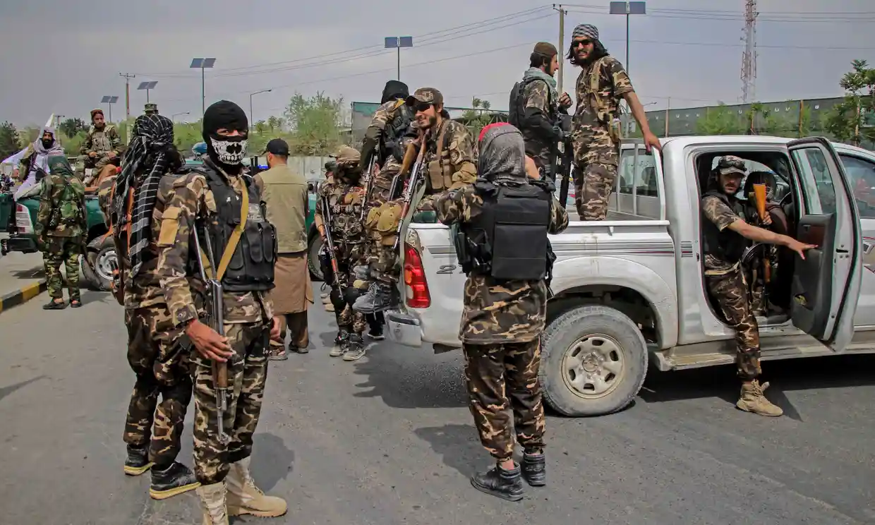 One of many Taliban patrols in Kabul, Afghanistan, which seek out LGBTQ Afghans and other people who are out of favor with the regime. (Photo courtesy of EPA and The Guardian)