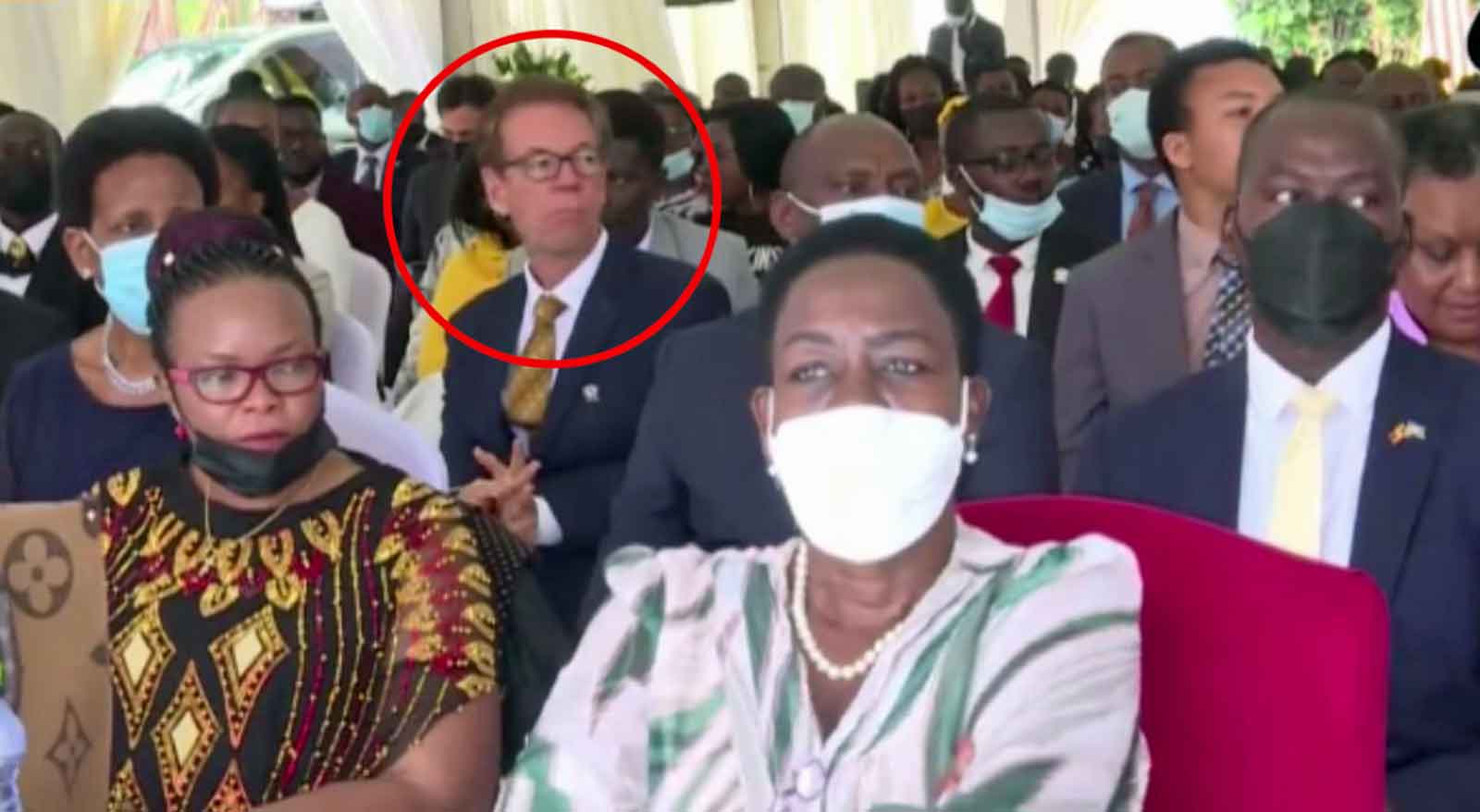 The Family's Uganda point man, Tim Kreutter (highlighted), a co-founder of Uganda's National Prayer Breakfast, listens during the Oct. 8, 2022, event, during which Uganda's president rallied listeners to resist Western pressure for LGBTQ+ tolerance. (Photo courtesy of TYT/screenshot/UBC Television Uganda)