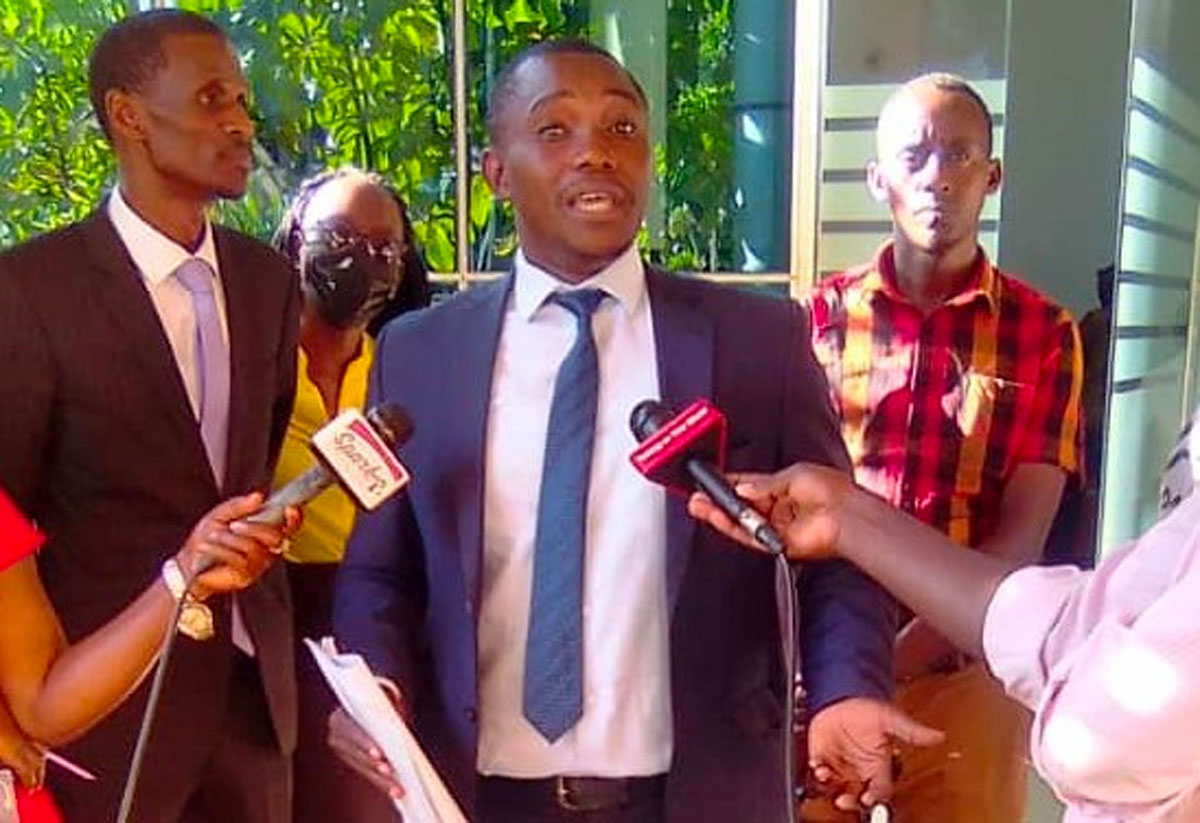 Dr. Adrian Jjuuko, executive director of HRAPF, speaks to the media on May 29 in Kampala, Uganda, after filing a petition seeking to nullify the entire Anti-Homosexuality Act 2023.(Gloria Nakiyimba photo courtesy of Capital Radio)