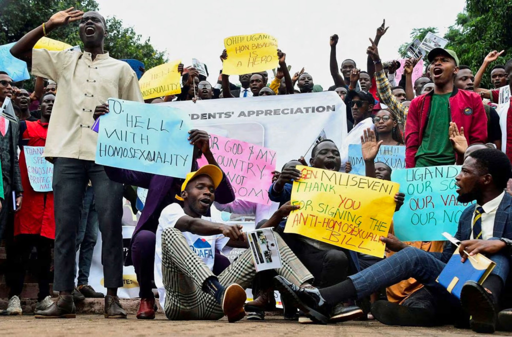 Ugandan students celebrate the enactment of the Anti-Homosexuality Law in May 2023. (Abubaker Lubowa photo courtesy of Reuters)