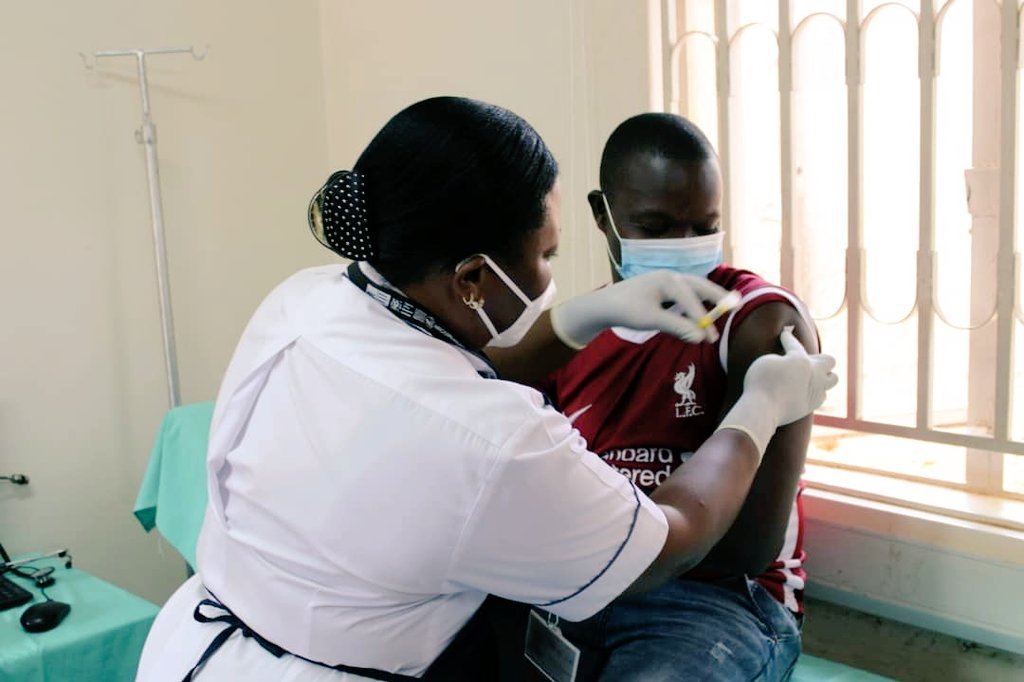The first PrEPVacc volunteer participant receives an injection in Uganda in 2020. (Photo courtesy of PrEPVacc)