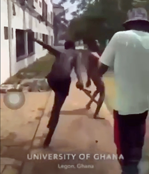 On the Legon campus of the University of Ghana on Jan. 24, 2024, a homophobic attacker wields a stick that he used to batter a young man who had been labeled as gay.(Screen shot from widely distributed online video)