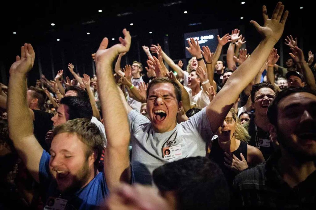 Students at Bethel Church's School of Supernatural Ministry students worship enthusiastically.(Max Whittaker photo courtesy of SFGate)