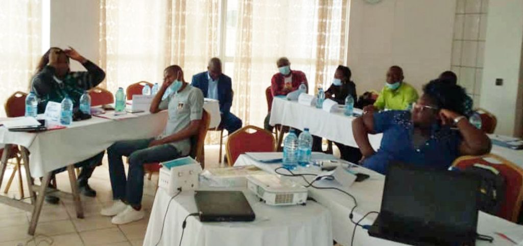 Participants relax during a break in the meetings about LGBTI rights in Yaoundé, Cameroon.