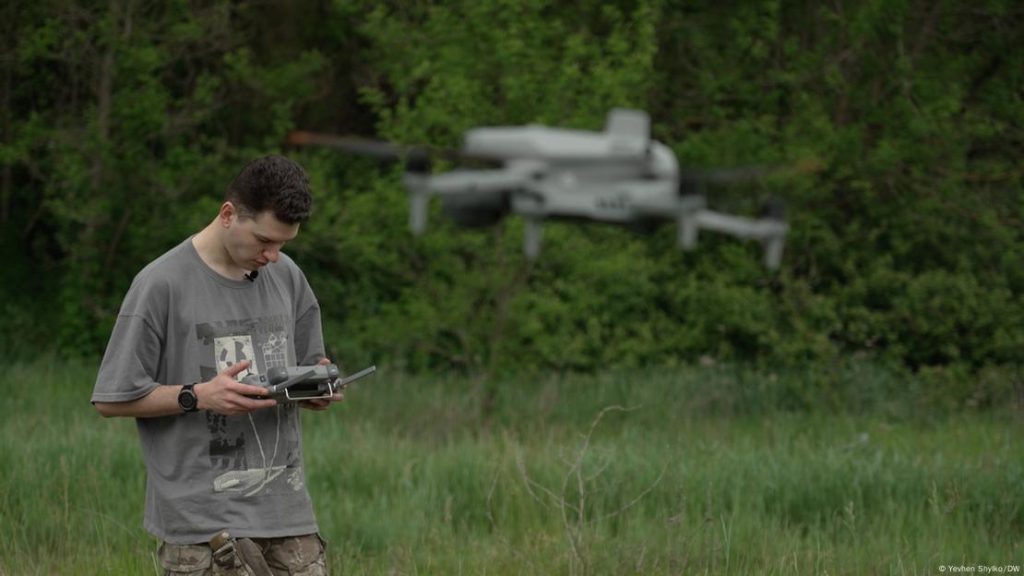 25-year-old gay drone pilot Roman Abrashyn steers a drone. He hasn't experienced prejudice or discrimination in the military, but worries about the rights of his and other same-sex partners ( Yevhen Shylko photo courtesy of DW)