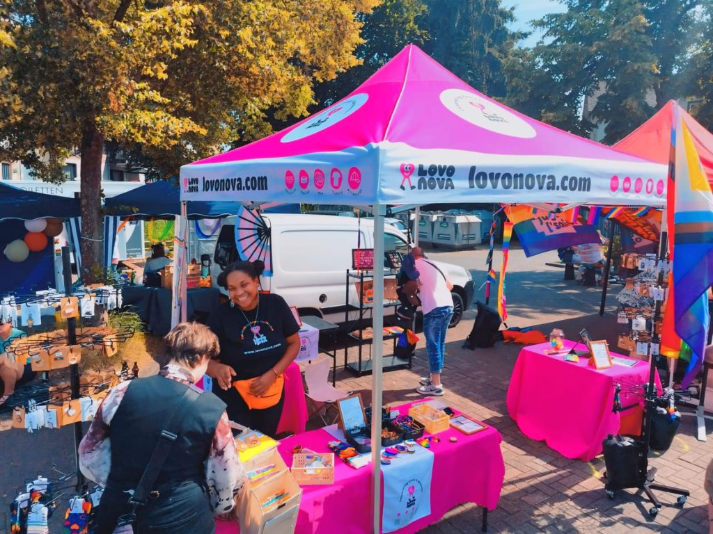 Every year between April and October, Sam G. travels to Pride marches across Europe to promote her products and offer colourful, fashionable accessories to a committed clientele.