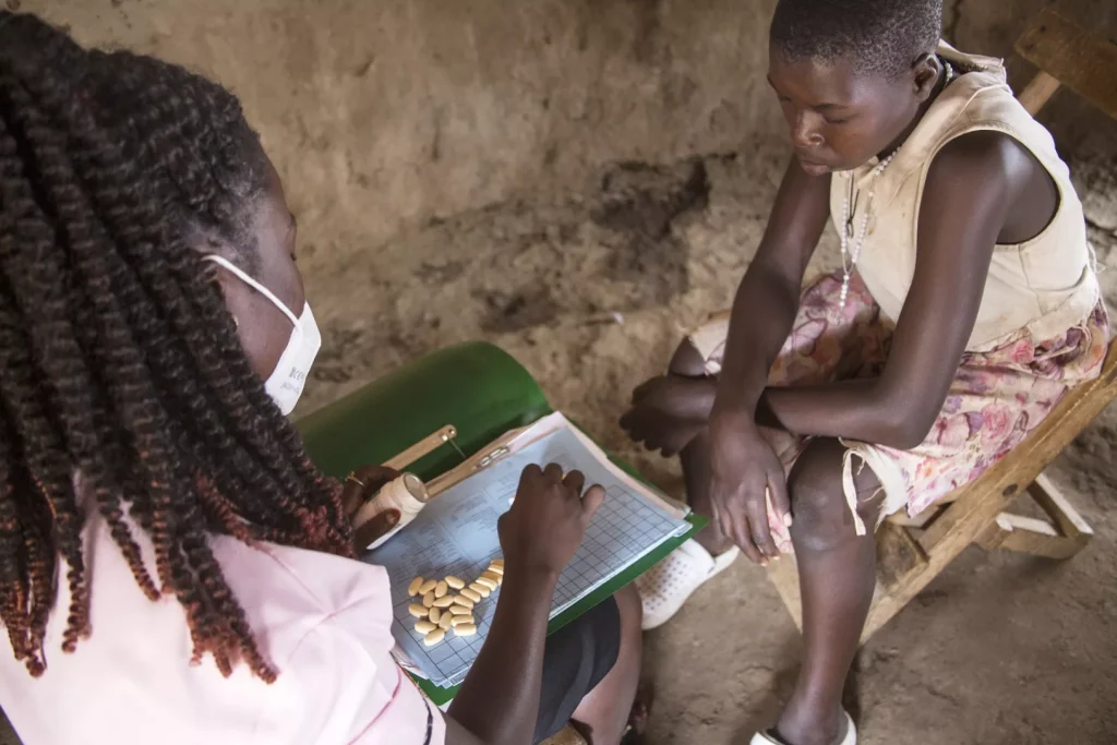 Patient visits an HIV clinic in rural Uganda (Photo courtesy of UNICEF)