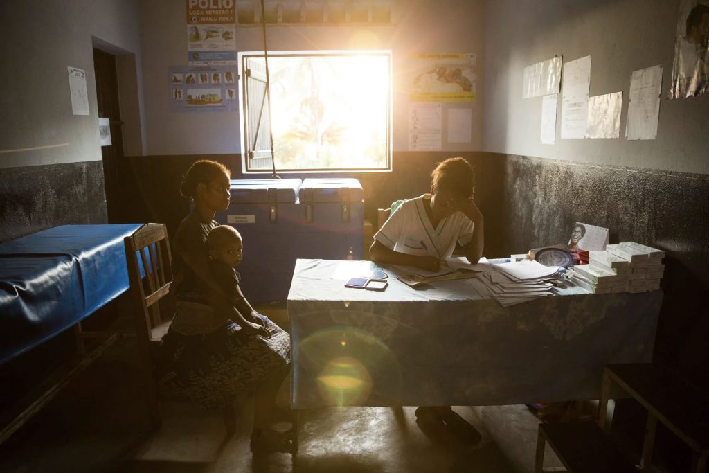 A 19-year-old woman talks with nurse Valeria Zafisoa at a traveling contraception clinic in eastern Madagascar run by the British nonprofit group MSI Reproductive Choices. That group lost $15 million in funding the last time Trump enforced the Mexico City policy. (Samantha Reinders photo courtesy of NPR)
