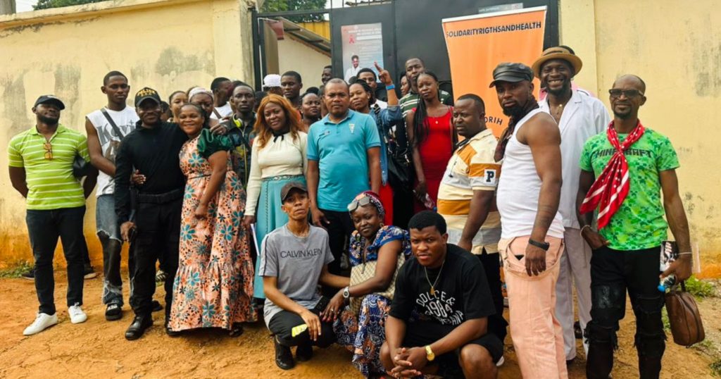 Participants pose for a photo at the Legal Cafe that's a regular monthly event presented by SOS Solidarity Rights and Health in Yaounde, Cameroon.