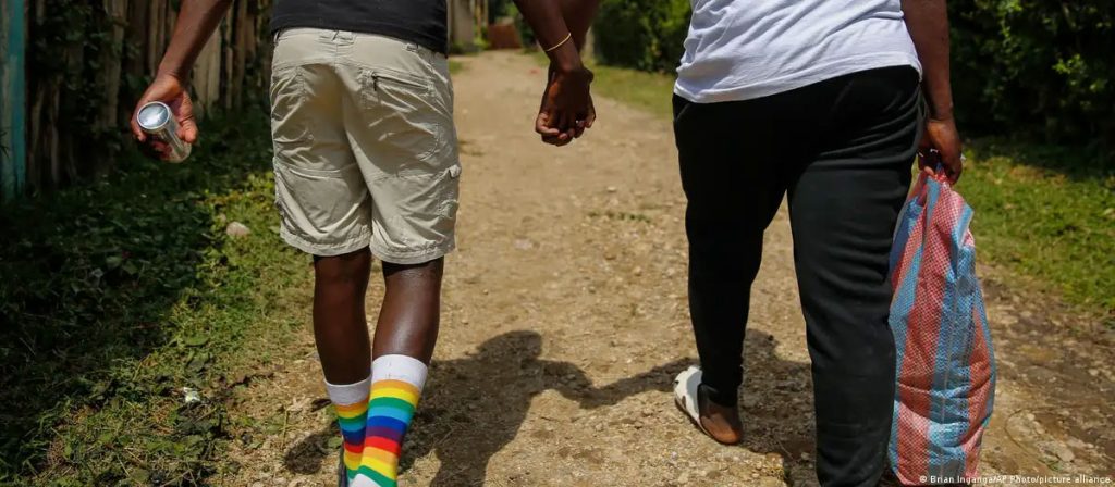 Same-sex couple in Uganda, where public displays of affection are dangerous. (Brian Inganga photo courtesy of AP and DW.com)