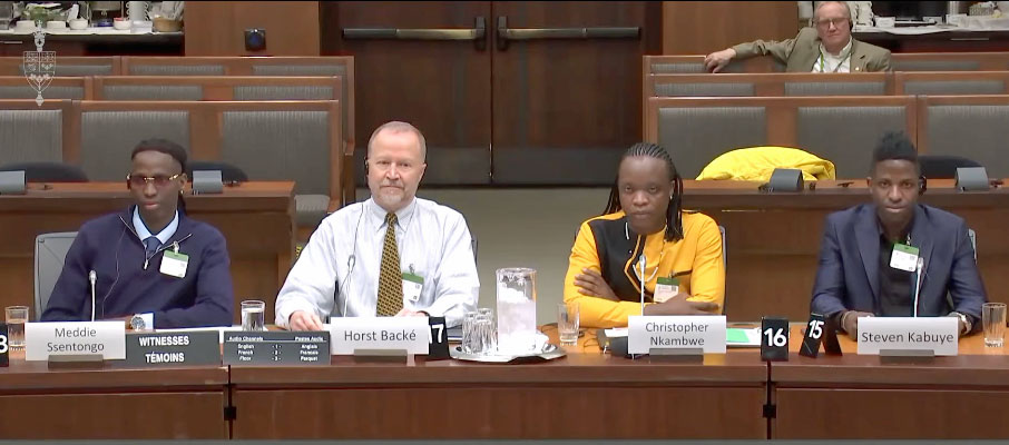 Meddie Ssentongo, Horst Backe, Christopher Nkambwe and Steven Kabuye appearing before a Canadian Parliamentary Committee to testify on the status of LGBTQI people in Uganda.