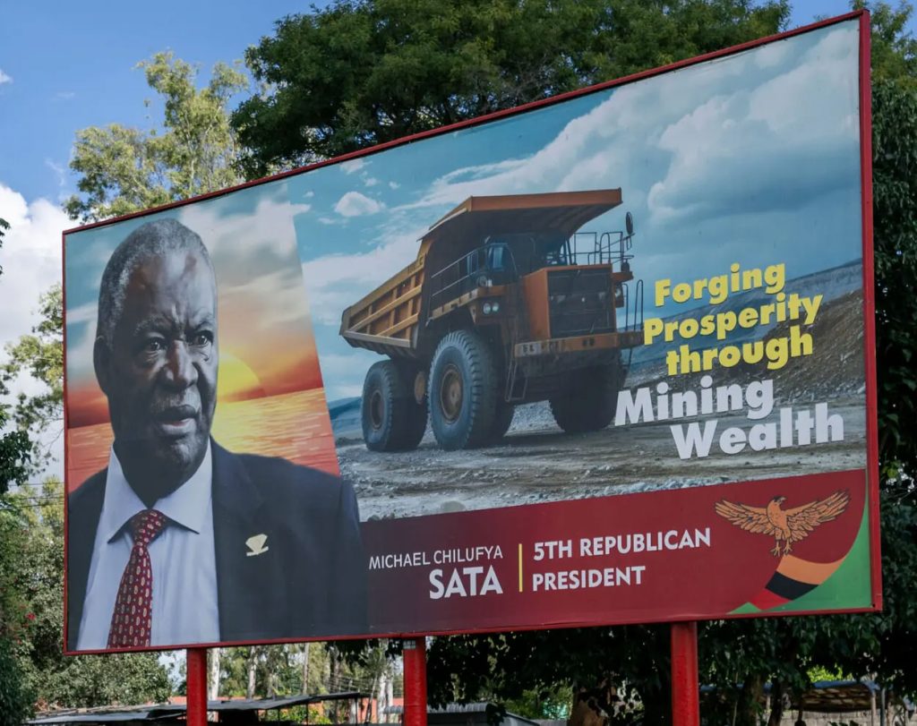 Billboard on a street in Lusaka, Zambia, celebrates the nation's mineral wealth . (Arlette Bashizi photo courtesy of The New York Times)
