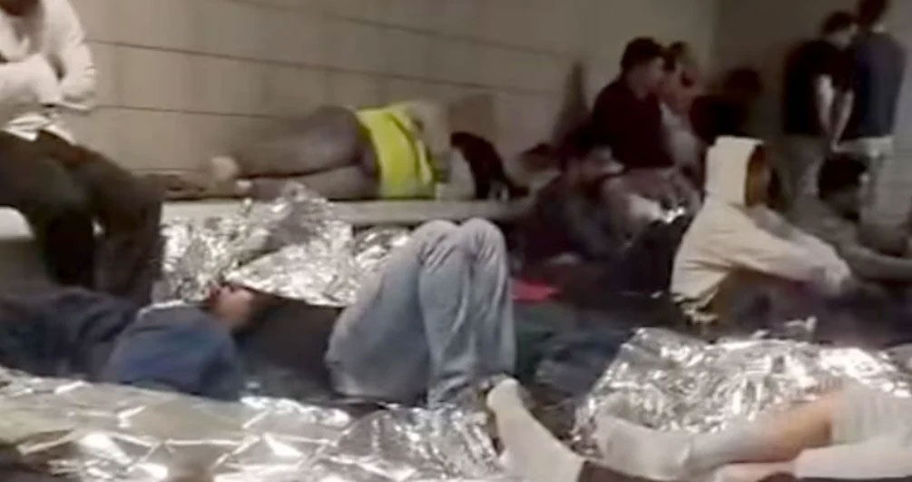 A rare image from a holding area inside the ICE facility in Baltimore. shows detainees and foil blankets. Human rights advocates have taken ICE to court over the treatment of detainees there. (Photo courtesy of Baltimore Banner / Facebook / Reddit)