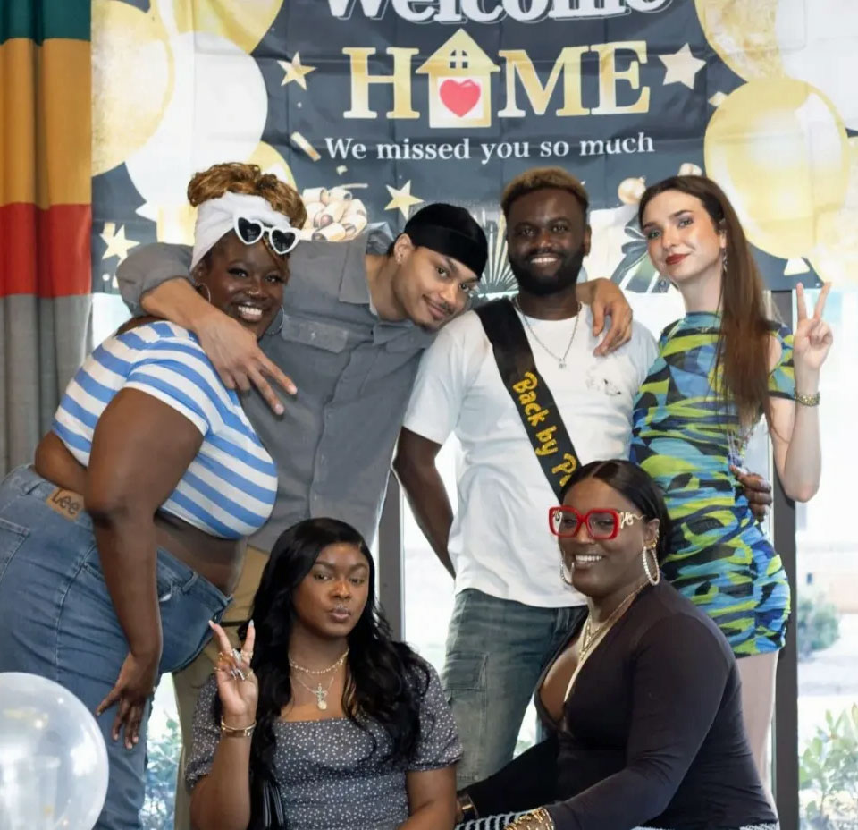 Ludovic Mbock and some of his supporters celebrating his return from detention. (Photo courtesy of TANTV News)