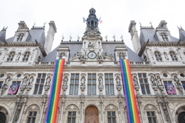 Rainbow flags decorate City Hall in Paris, France. (Photo courtesy of Tetu)