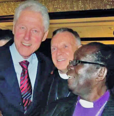 President Bill Clinton; the Rev. Albert Ogle, founder of the St. Paul's Foundation for International Reconciliation; and Bishop Christopher Senyonjo in 2012, when Senyonjo received the Clinton Global Citizen Award,.