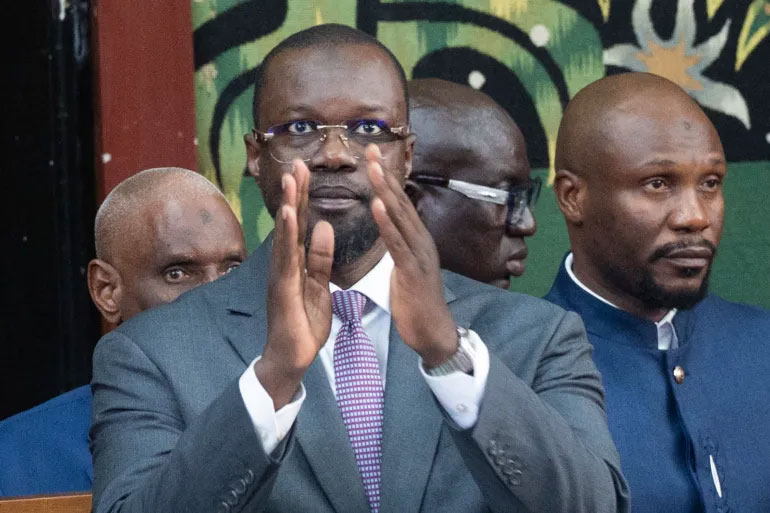 Ousmane Sonko (center) was elected speaker of Senegal's National Assembly on May 26, four days after President President Bassirou ⁠⁠Diomaye Faye dismissed him as prime minister. (Photo courtesy of AFP)