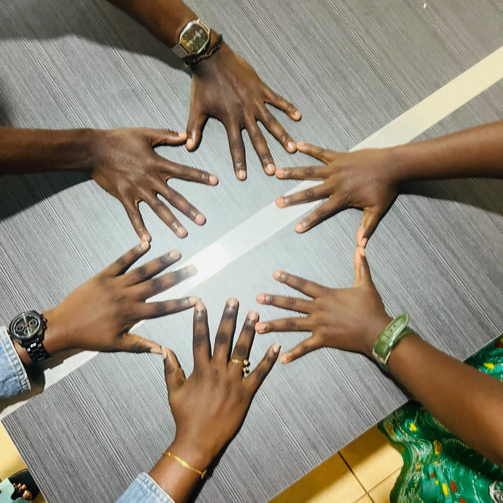The three friends celebrated their release from prison but, for their safety, they did not want their names or faces to be used in this article. (Photo by Steeves Winner)