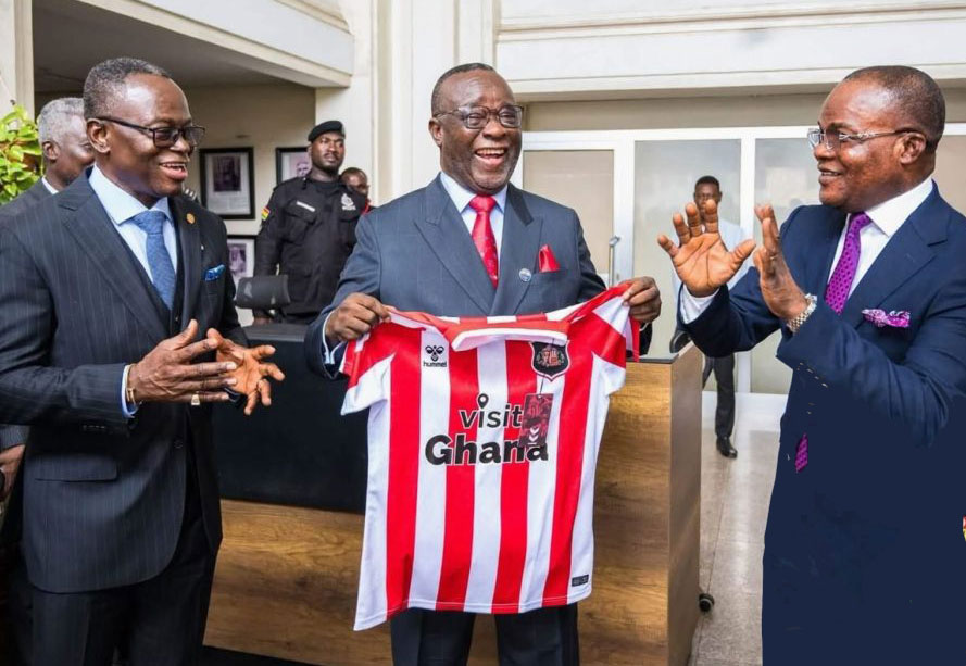 Ghana officials display "Visit Ghana" shirt they wanted Sunderland football/soccer players to wear. (Photo courtesy of the Parliament of Ghana)