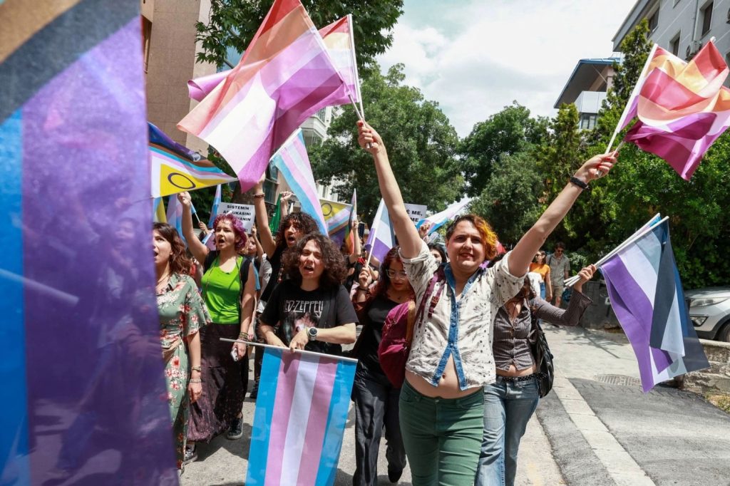 LGBTQ activists march in a Pride parade despite a ban by local authorities in Ankara on June 20, 2026. (Photo courtesy of Japan Times / Reuters)